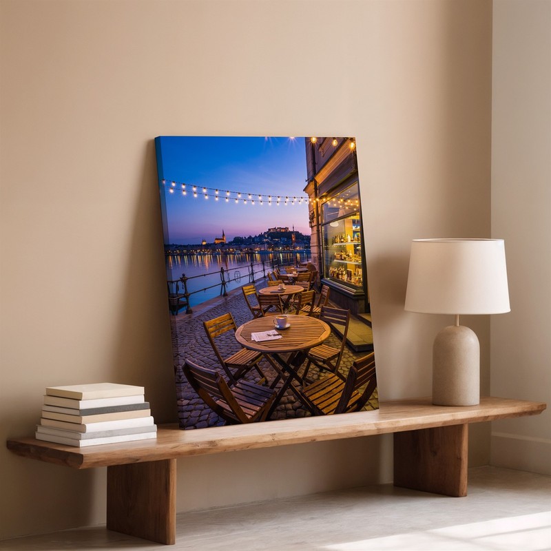 Cozy Outdoor Café Scene At Dusk, Featuring A Round Wooden Wall Art Canvas Print gallery