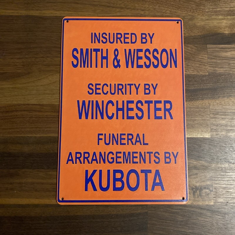 Funny Saying Metal Sign “Insured By Smith & Wesson…”
